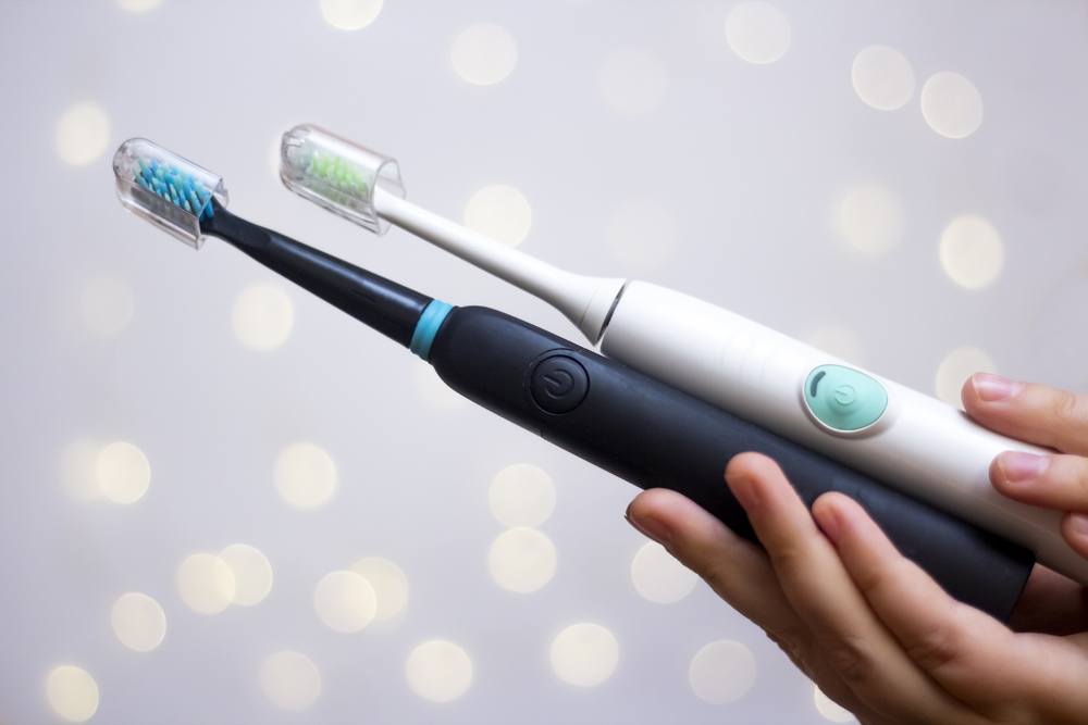 Two electric toothbrushes